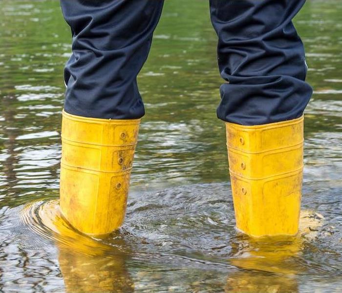 Boots in flood water
